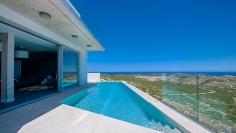 High quality contemporary villa next to nature reserve offering amazing sea views