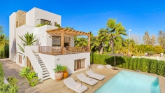 Unique: Luxurious new-build Ibiza style villa right on the beautiful sandy beach of Oliva