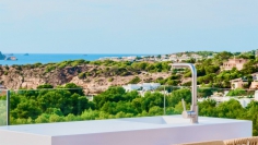 Stunning new build Ibiza villas with beautiful sea views at walking distance from the beach in Cala Tarida