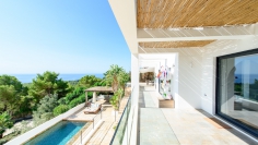 Stunning modern villa with spectacular sea views and rental license in Es Cubells