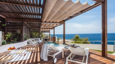 Stunning Ibiza villa with spectulair frontline sea views and touristic license near Es Cubells