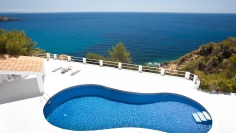 Stunning Ibiza villa with spectulair frontline sea views and touristic license near Es Cubells