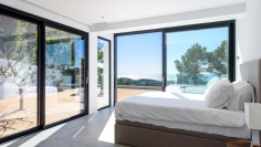 Beautiful modern Ibiza style villa with amazing sea views for sale in Es Cubells