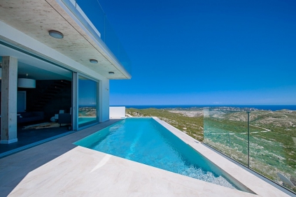 High quality contemporary villa next to nature reserve offering amazing sea views