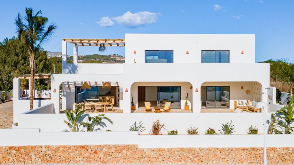 Beautiful key-ready luxury new build Ibiza style villa with sea views in Moraira