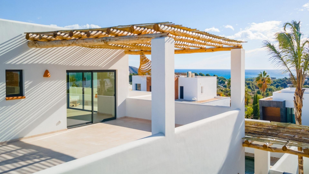 Beautiful key-ready luxury new build Ibiza style villa with sea views in Moraira