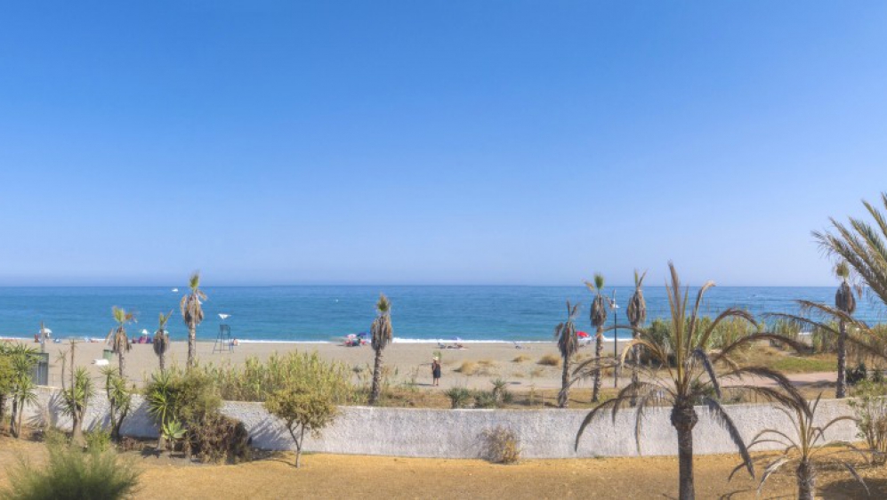 Contemporary beachfront designer villa with direct private access to the beach in the New Golden Mile.