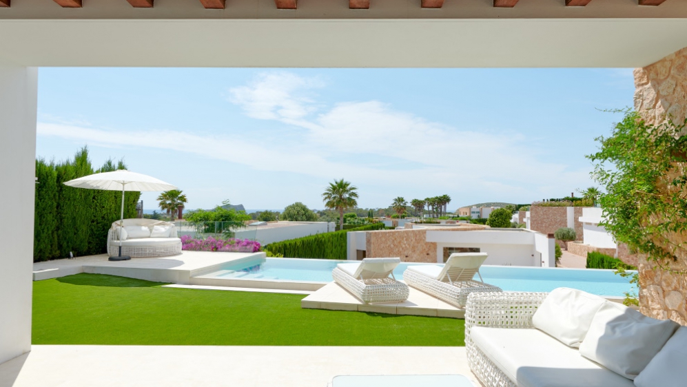 Stunning modern Ibiza villa with rental license in private urbanisation close to the beach