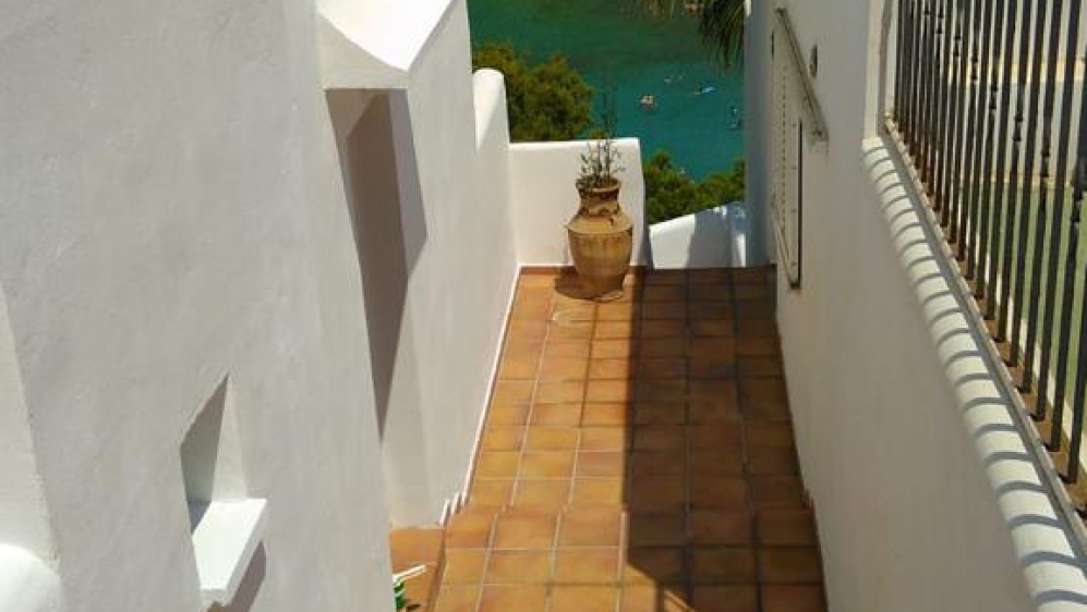 Fully renovated townhouse overlooking the bay and beach of Cala Vadella