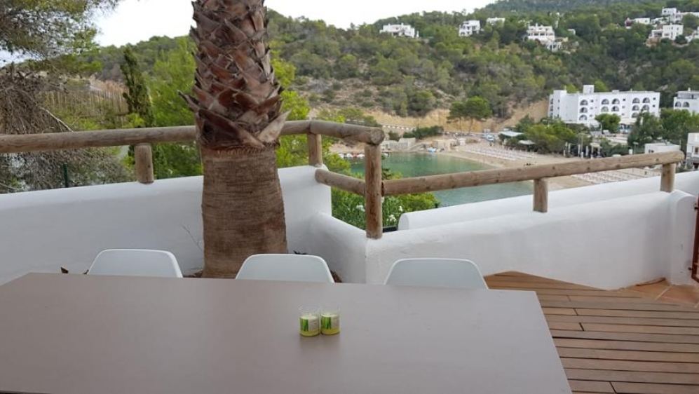 Fully renovated townhouse overlooking the bay and beach of Cala Vadella
