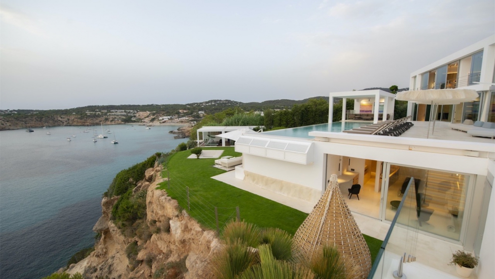 Spectacular sea front designer villa with amazing views over the bay of Cala Tarida