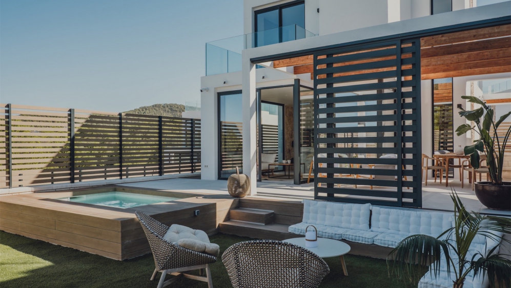 Stunning new Ibiza-style villa with sea views just a short stroll from the beach of Cala Tarida