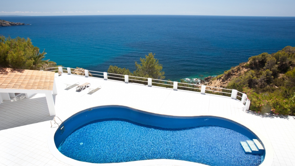 Stunning Ibiza villa with spectulair frontline sea views and touristic license near Es Cubells